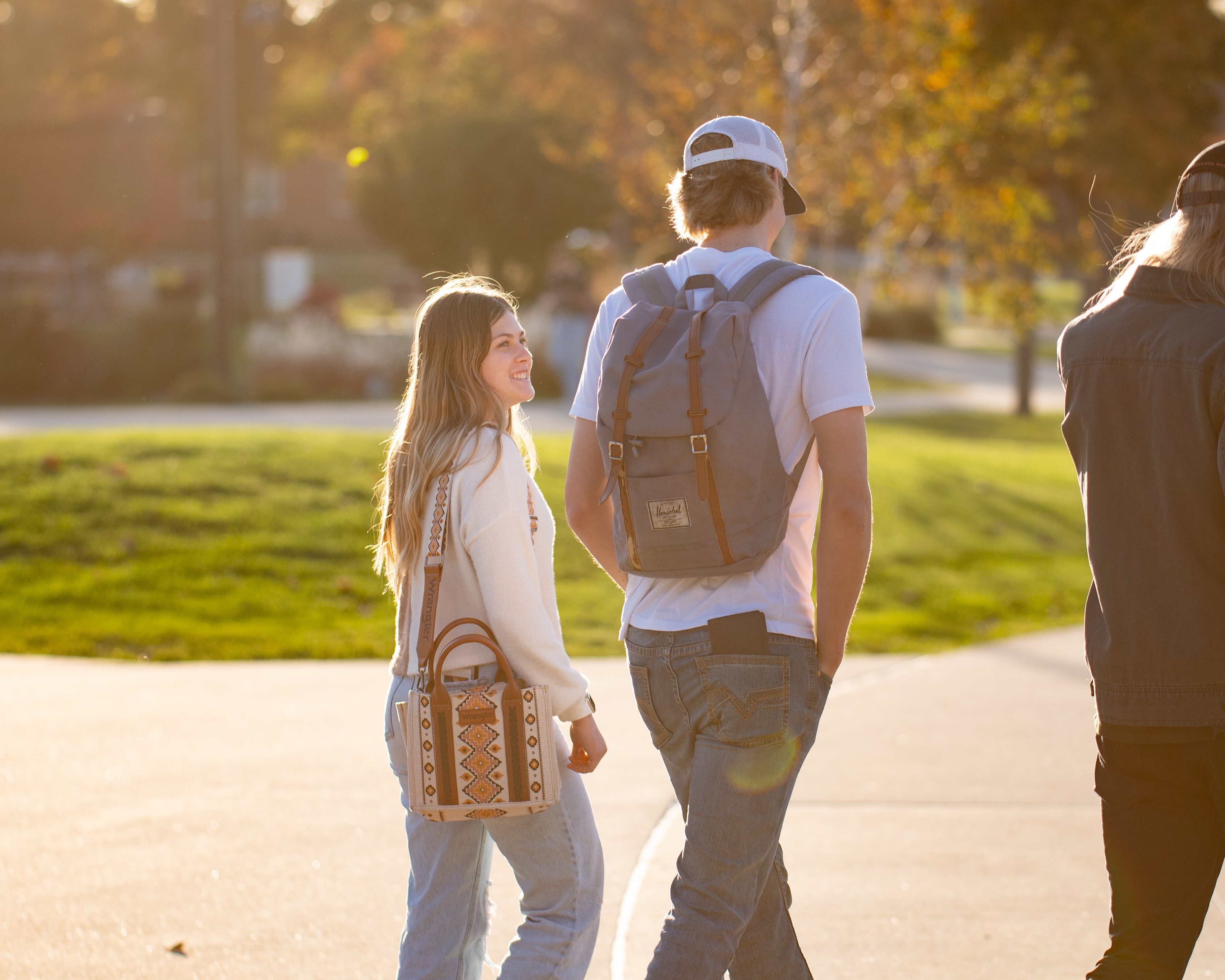 Students walking a crossed campus