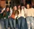 Female students smiling as they walk together