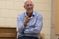 Male professor uses hands to speak