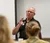 Male professor teaches his class