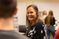 Female professor engages with a student