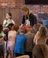 Danica Buys hands out gifts to small children.