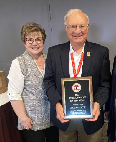 Geralyn and Fred Sick stand side by side, smiling.