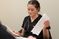 Female student looking through paperwork