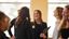 A group of females talking to each other