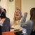 Female student laughs with her friends