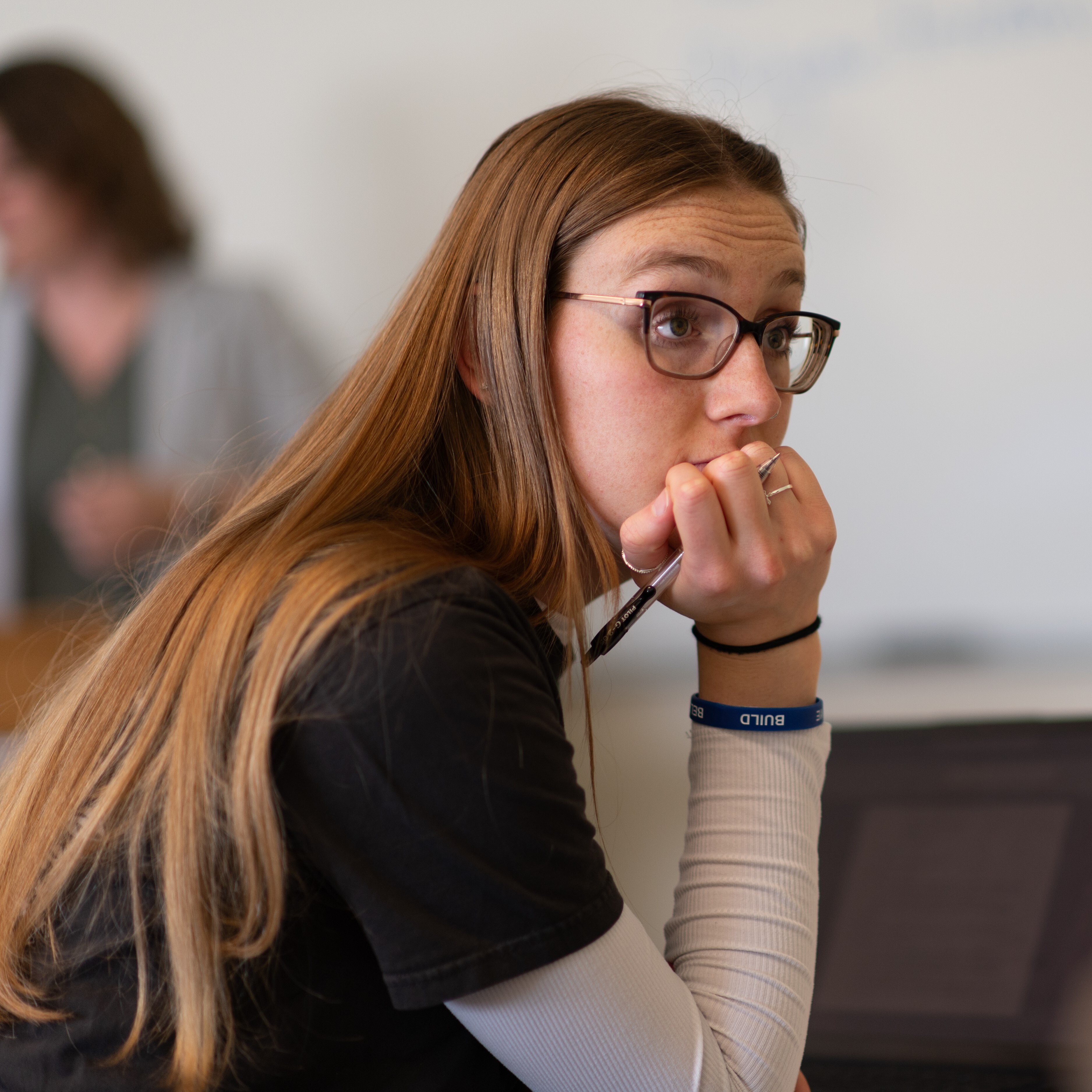 Female student engaged in class