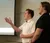 Male student presents Infront of class