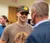 A male student talks to the president
