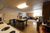 Students sitting in an East campus apartment