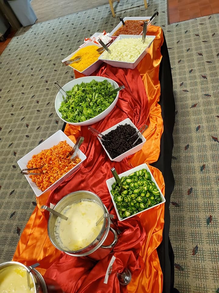 A variety of food spread out on a table