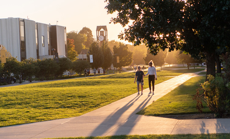 Two Dordt students walking through the campus