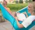 Two Dordt students laying in a hammock laughing