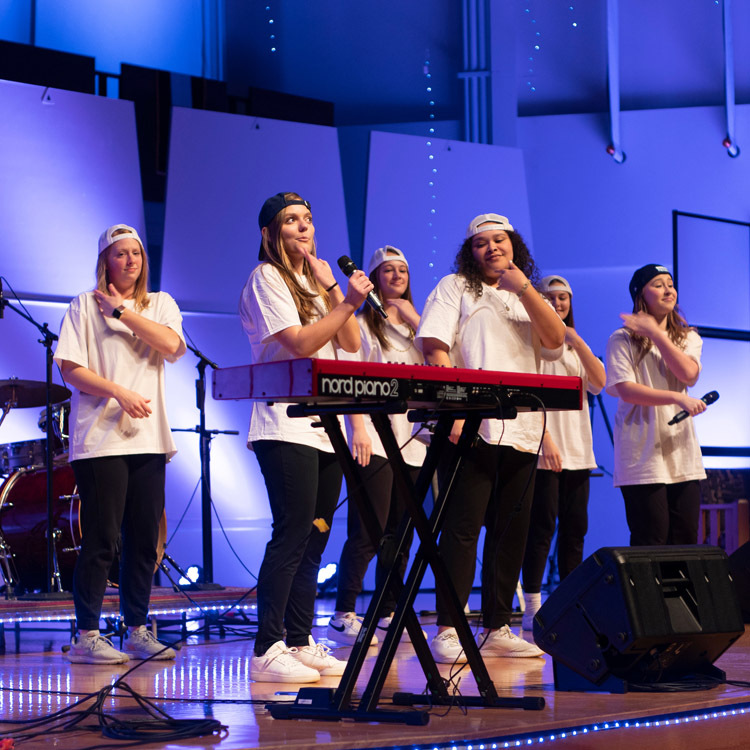 Dordt students on stage giving a musical performance