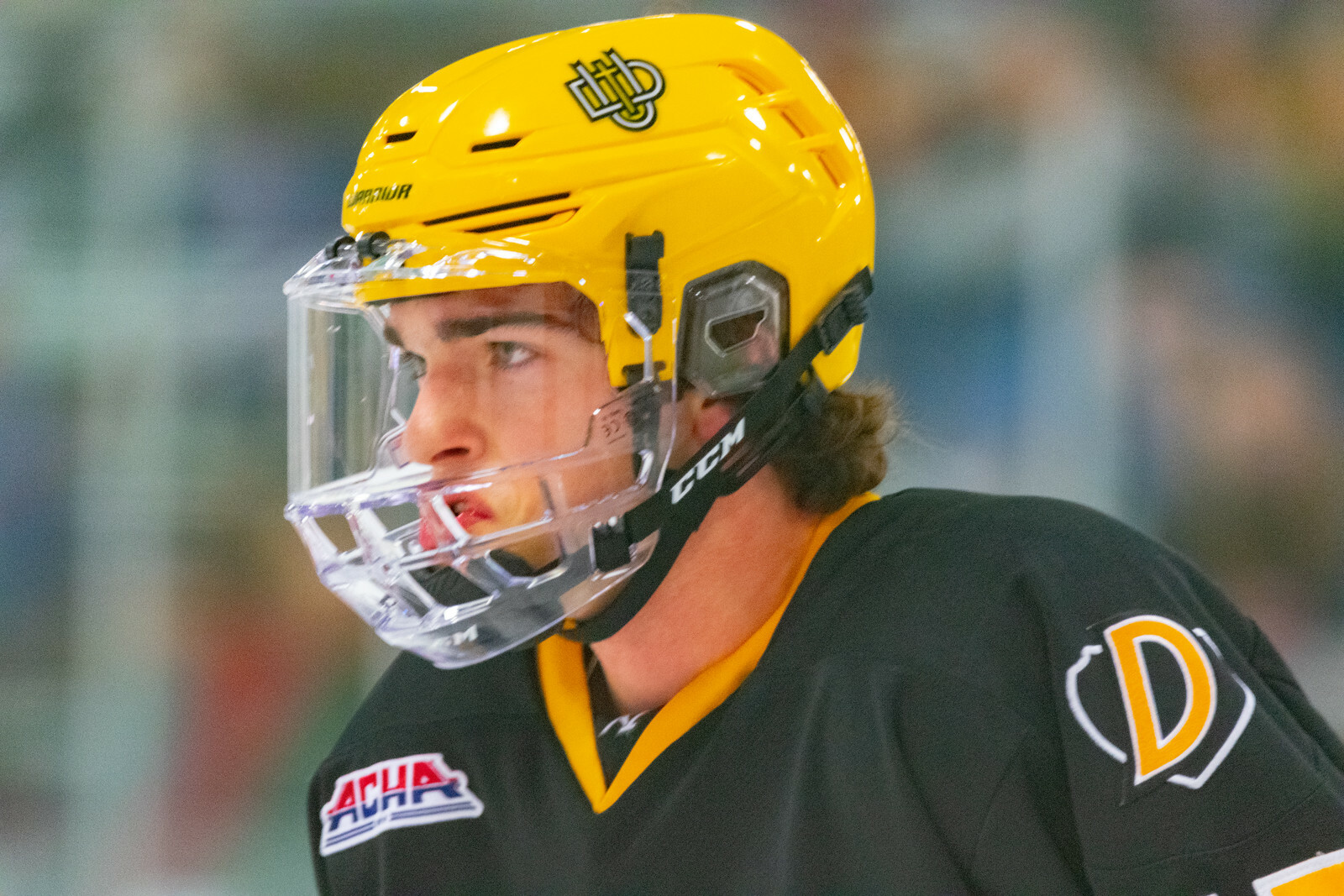 A picture of a Dordt hockey player during a game