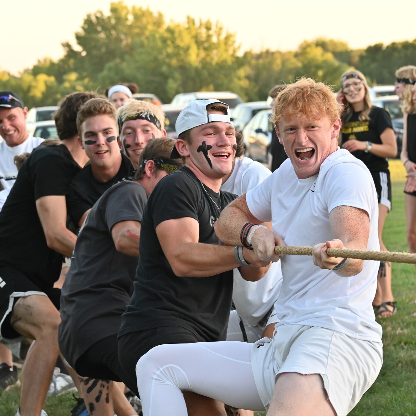 Male students playing a game of Tug-of-War