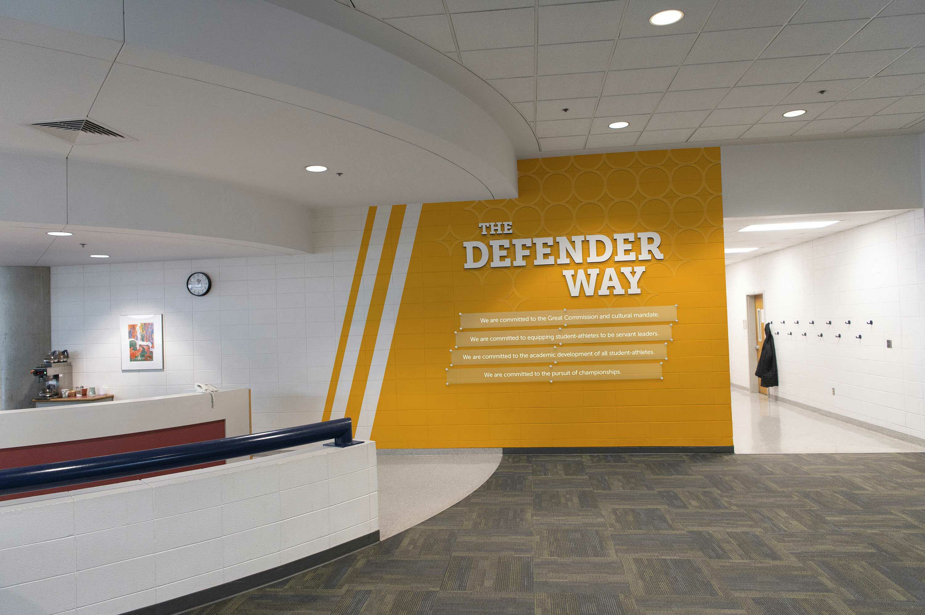 A picture of the defender way plaque in the rec center