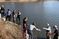 Students study species in the pond