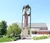 A picture of Dordt's clock tower with the campus center behind