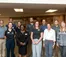 A group photo of 11 new faculty members