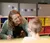 A teacher helps a special education student