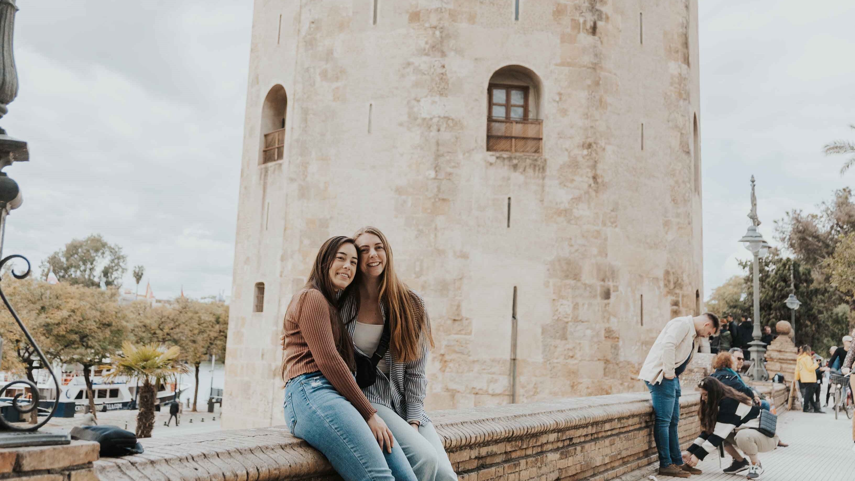 Female students sit on ledge in Austria