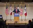 A picture of Donald Trump giving a speech in the BJ Haan