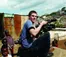 A picture of a man recording some footage