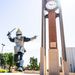 dash celebrating by clock tower