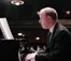 Dr. Wottrich playing piano