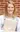 A picture of a women in a light blue shirt with holding a laptop