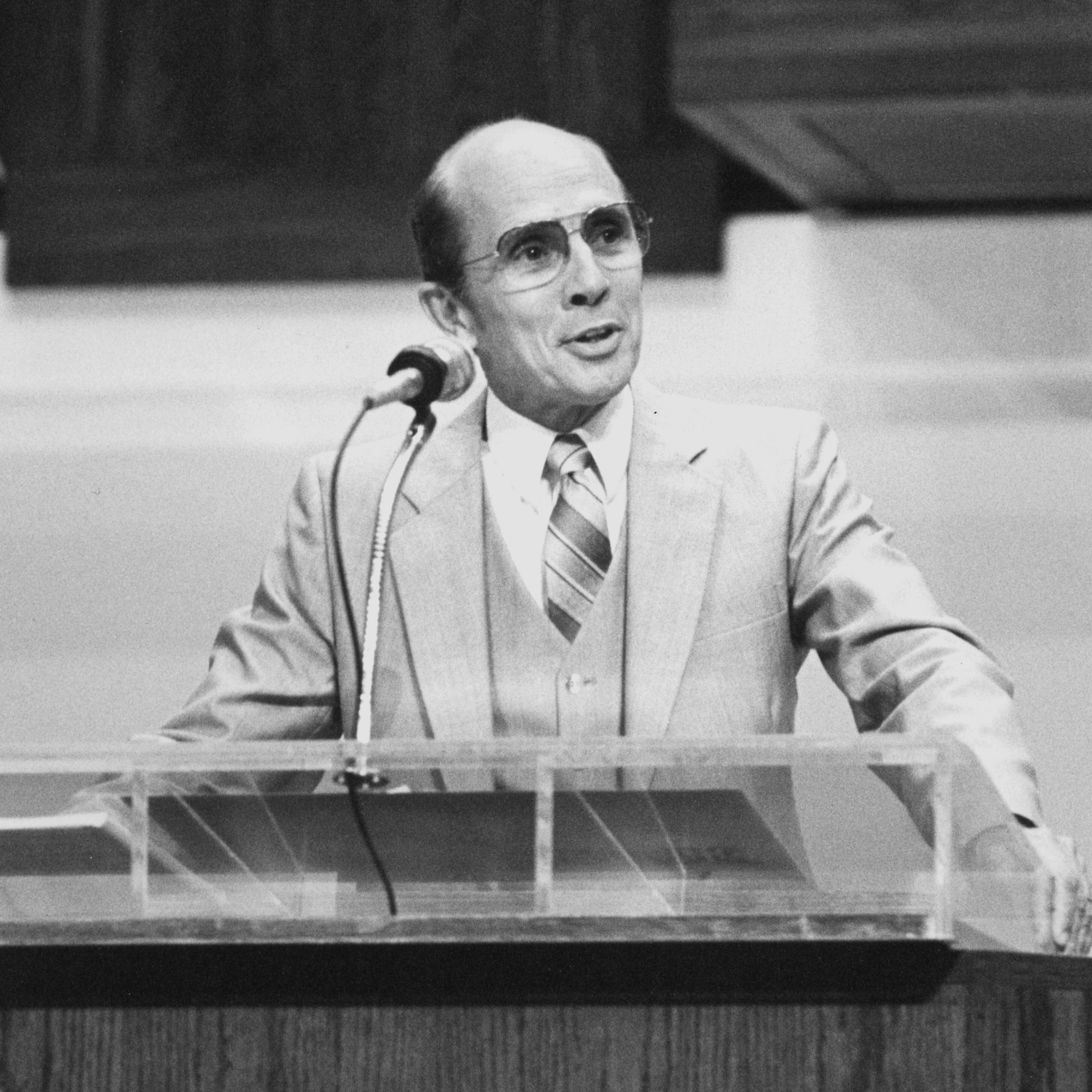 A picture of John Hulst giving a message