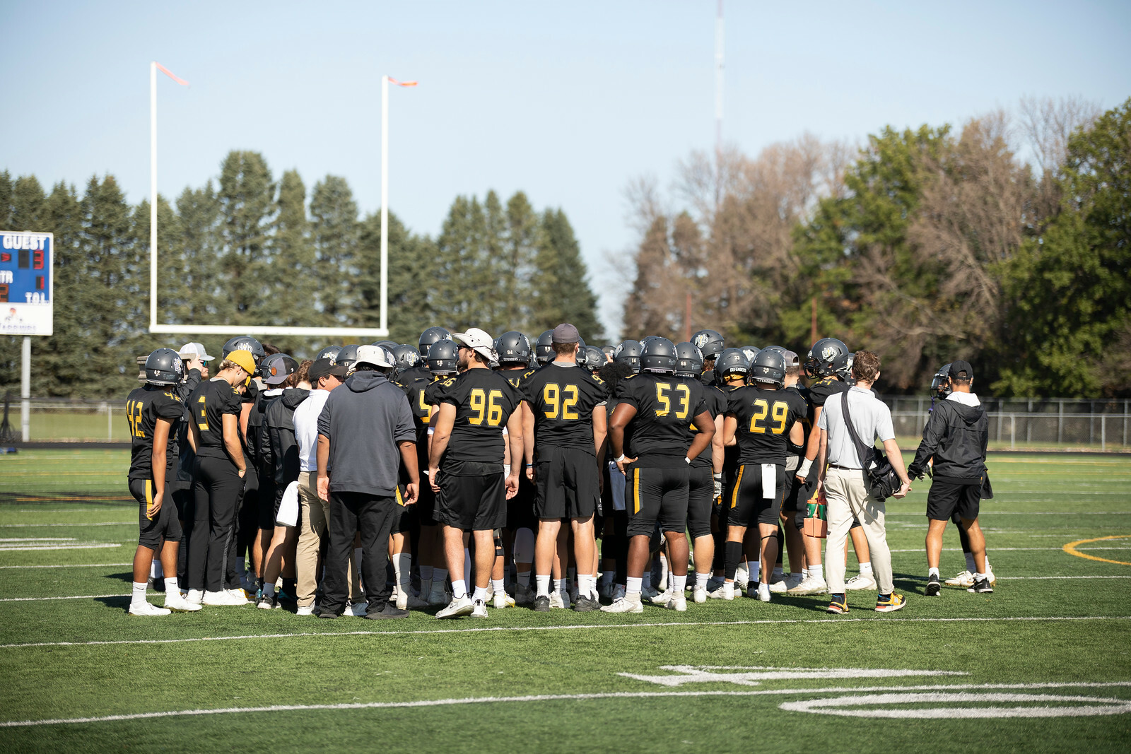 The Dordt football team during a huddle