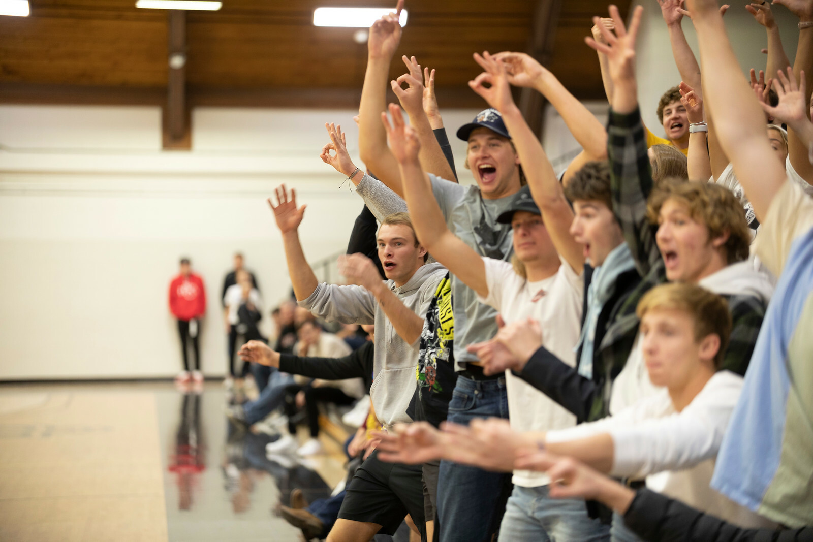 A picture of Dordt fans cheering at a game