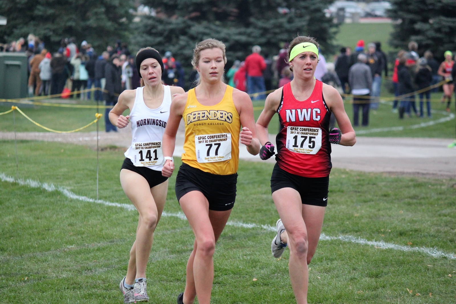 A Dordt Women's Cross Country runner competes at the Conference race