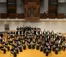 Dordt Wind Symphony poses on stage in the B.J. Haan Auditorium