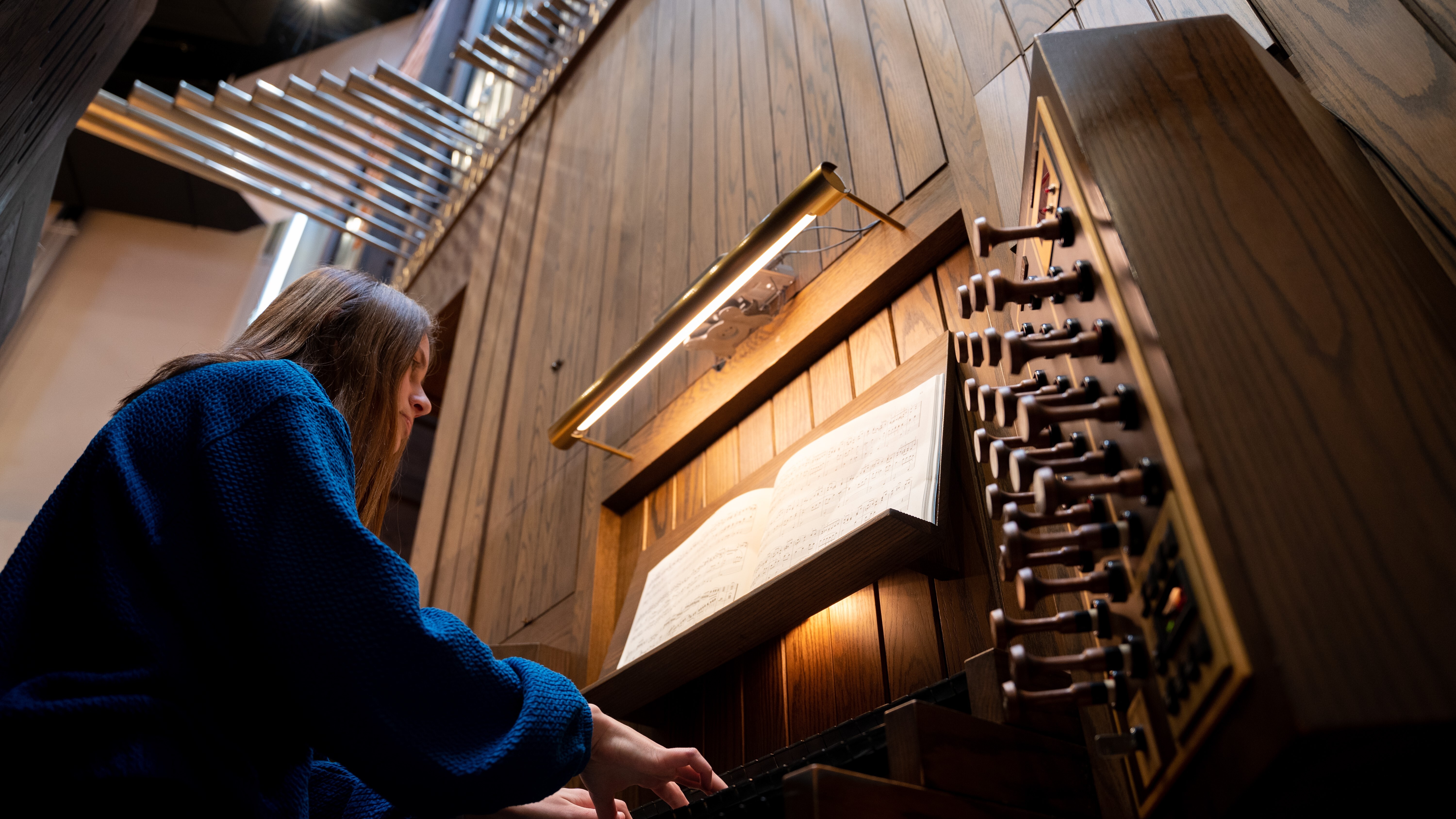 student playing the organ