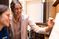 Female professor helps student learn music