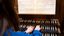 Student plays organ